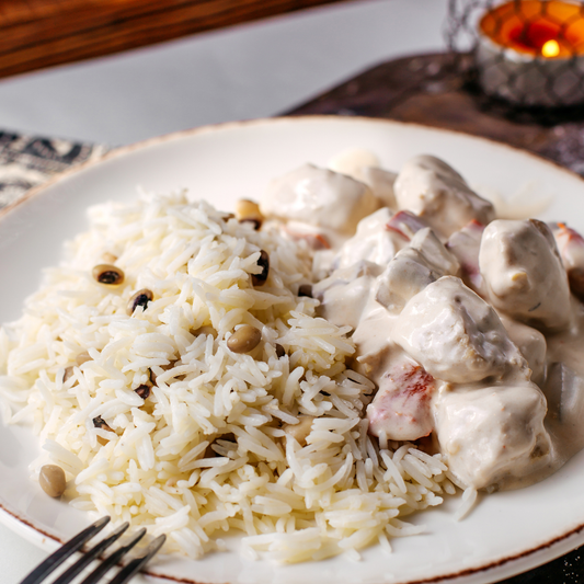 Blanquette de veau, champignons, carottes et oignons, riz basmati