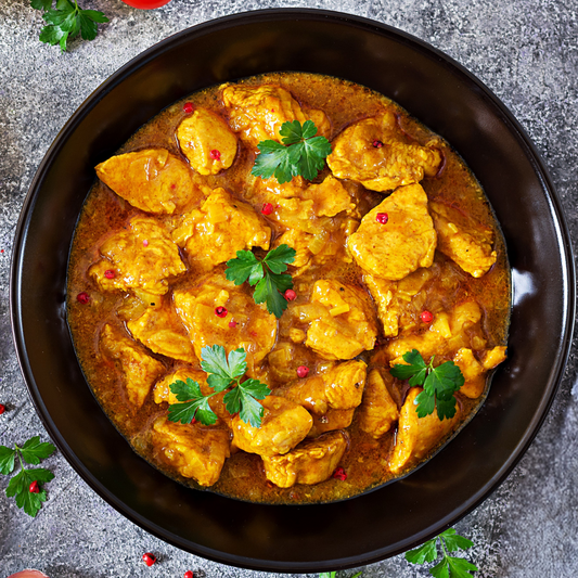 Poulet mijoté aux saveurs indiennes, riz basmati